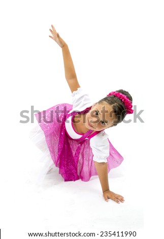 Beautiful little girl smiling with colorful dance dress