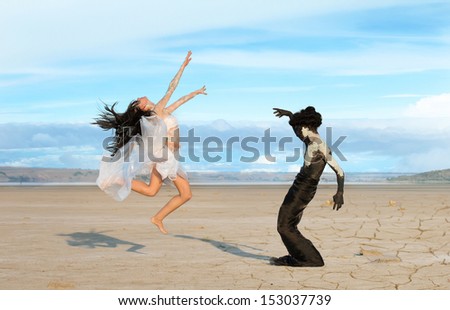 Spirit of earth and air. Two figures with natural body paint and makeup.