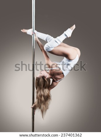 Pole dancer, woman dancing on pylon