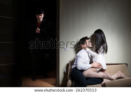 Man arriving home while his wife cheating with another guy
