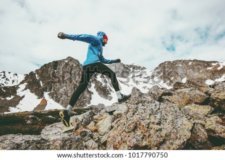 Running Man active vacations in mountains travel adventure healthy lifestyle endurance concept skyrunning sport