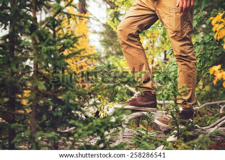 Feet Man walking Outdoor Travel Lifestyle Fashion trendy style forest nature on background film effects colors