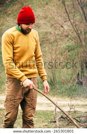Man Traveler alone in forest survival concept Lifestyle nature on background