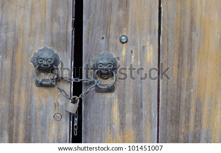 old wood door lock with master key.
