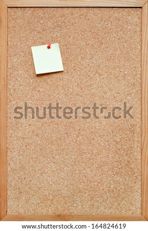 blank cork board / bulletin board with a wooden frame