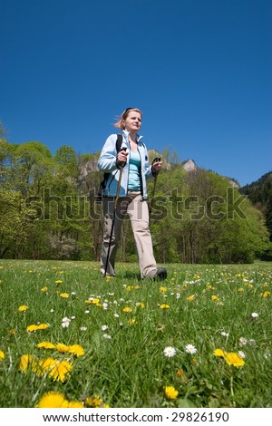 Young woman is hiking in Slovakia. Beautiful spring day