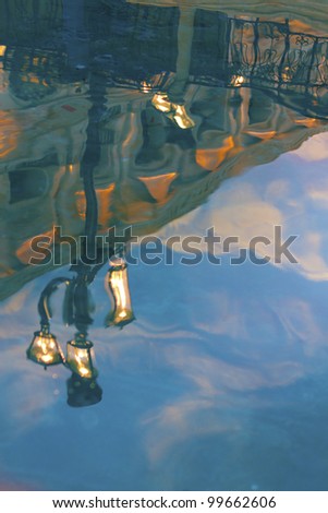 reflection of the street lamp on the water