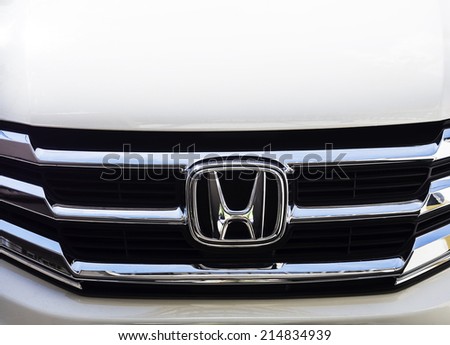 BANGKOK - AUGUST 23, 2014: Logo of Honda car in use on Bangkok, Thailand. Honda is a Japanese public multinational corporation and manufacturer of automobiles.
