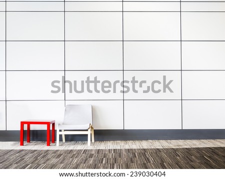 small table and chair placed on the carpet floor on modern wall, minimal concept