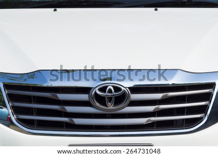 BANGKOK, THAILAND - MARCH 07, 2015: TOYOTA logo on the front of a car. TOYOTA is Japanese\'s car manufacturer which sold around the world.