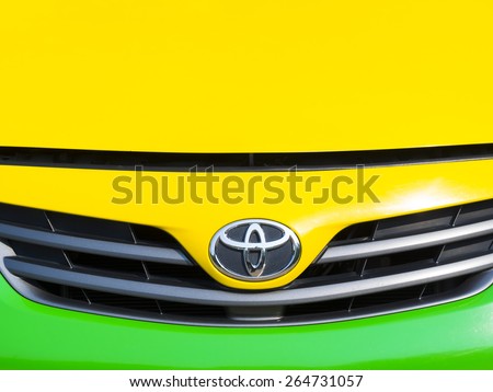 BANGKOK, THAILAND - MARCH 07, 2015: TOYOTA logo on the front of a car. TOYOTA is Japanese\'s car manufacturer which sold around the world.