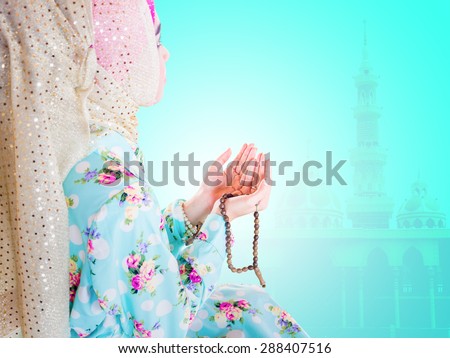 young muslim woman praying for Allah, muslim God