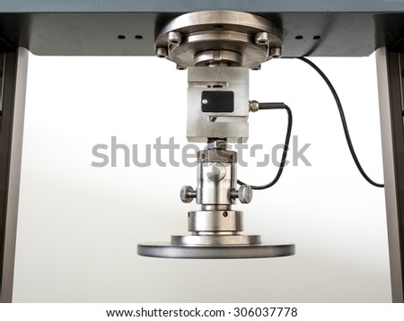 engineering testing machine, tensile strength test in preparation stage, circular plate can press sample to calculate physical property of material