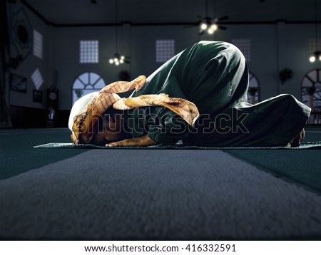muslim child worshiped Praying for Allah, muslim God, prostrate on the mosque floor background