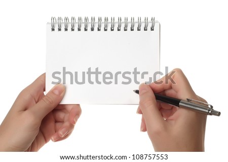 Hands with pen over note paper isolated on white background