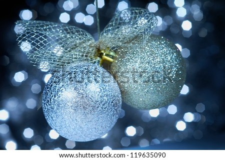 Christmas balls on glittering the background