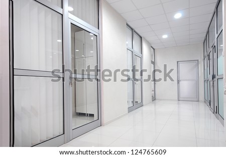 Empty Long Corridor In The Modern Office Building