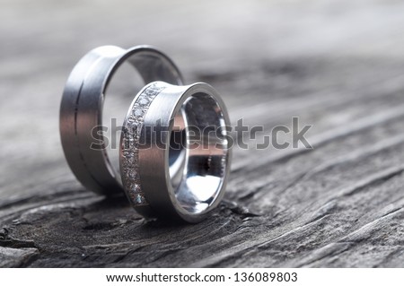 wedding rings on wood