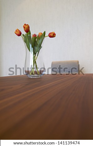 home interior decoration, vase of tulips on table
