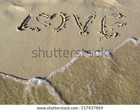 love message written in sand