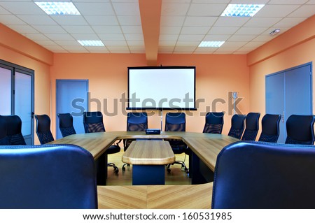 Conference Room With Projector Screen