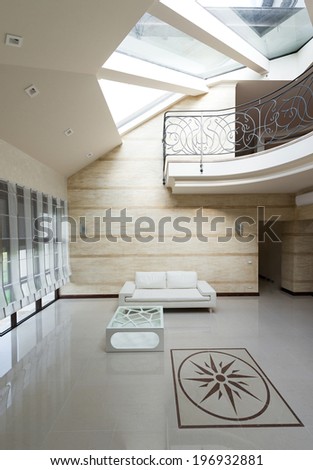 Modern apartment hall interior with white sofa