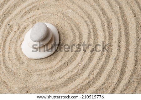 Stones on raked sand