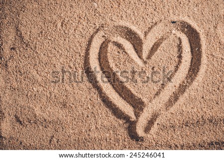 Heart drawn on the sand