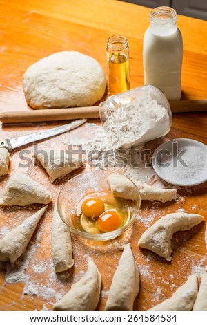 hand made bread dough cut and prepare into bread rolls