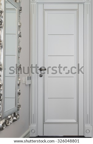 White wooden door in modern apartment