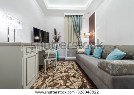 sofa with decorative pillows in the guest room