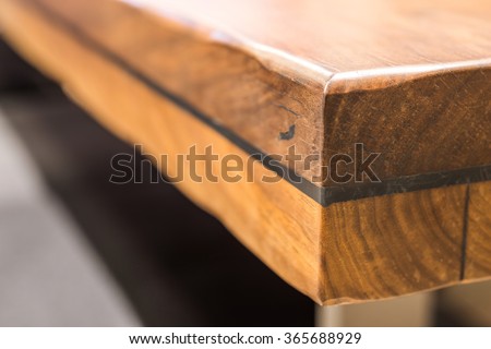 Close-up of a luxurious table corner , vintage solid wood furniture detail