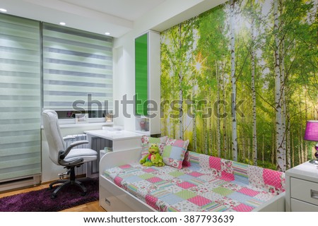 Children\'s room with wallpaper mural photo
