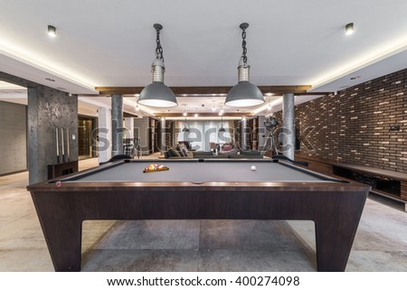 Interior of a luxury living room with billiard table