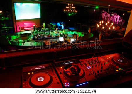 view to a night club over dj decks
