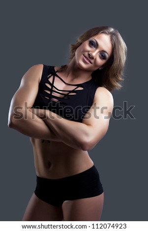 Young Athletic woman body builder portrait
