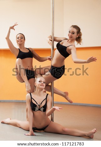 Young women doing gymnastic exercise