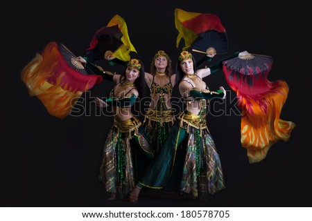 Image of young graceful oriental dance performers