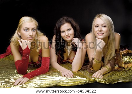 Three young beauty  woman  on gold wing