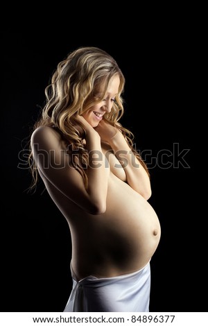 stock photo Beauty nude blond pregnant woman close breast