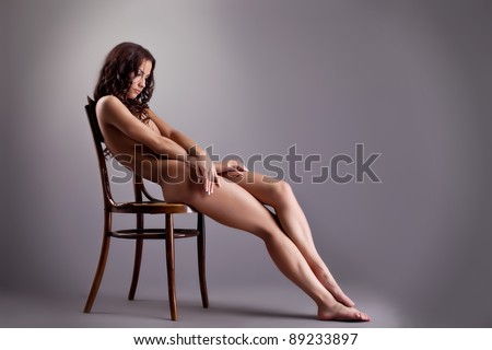 stock photo Perfect naked girl lay on white