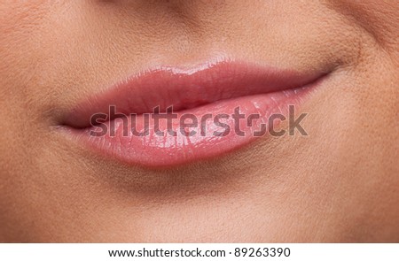 Beauty woman lips smile contempt close-up