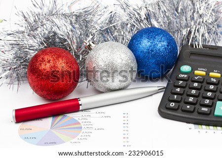 Business Christmas of red balls, pen, calculator, tinsel