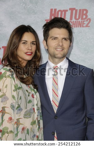 LOS ANGELES - FEB 18: Adam Scott, wife at the 'Hot Tub Time Machine 2' premiere on February 18, 2014 in Los Angeles, California