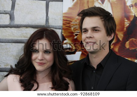 LOS ANGELES - APR 11:  Caitlin Custer, Johnny Simmons arriving at the LA premiere of HBO Films \'Cinema Verite\' at Paramount Studios in Los Angeles, California on April 11, 2011.