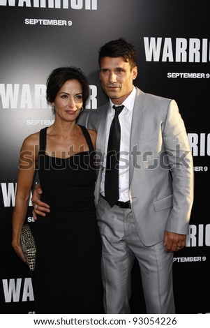 LOS ANGELES - SEP 6: Frank Grillo; wife at the world premiere of \'Warrior\' on September 6, 2011 in Los Angeles, California