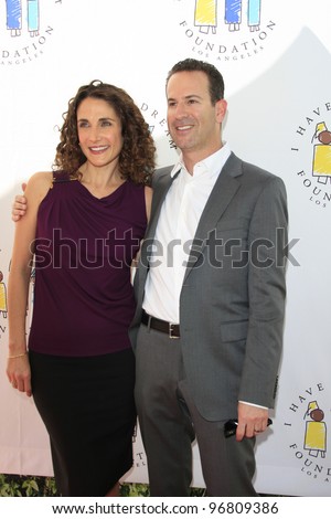 LOS ANGELES, CA - MARCH 4: Melina Kanakaredes, Darryl Frank at the I Have A Dream Foundation\'s 14th Annual Dreamers Brunch at The Skirball Cultural Center on March 4, 2012 in Los Angeles, California
