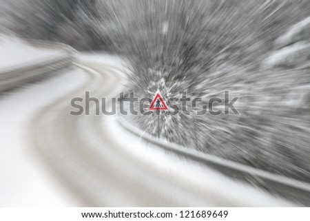Pedestrian warning sign on a heavy snowy road. Motion zoom effect visualizies the warning, caution and dynamics.