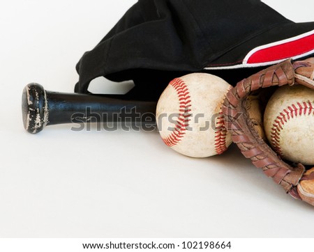 old glove, bat and baseballs isolated on white with copy space