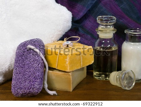 Spa and skincare products including handmade soaps, pumice stone and essential oils.